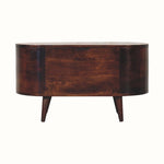 A light walnut-colored storage box with a lift-up lid, featuring curved lines and resting on short, sturdy legs.