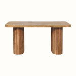 A natural finish Jalla Bench made from solid mango wood, featuring a hand-carved grooved body and chunky legs.