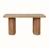 A natural finish Jalla Bench made from solid mango wood, featuring a hand-carved grooved body and chunky legs.